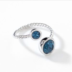 Touchstone Crystal Curled Up Ring in Montana, size 8